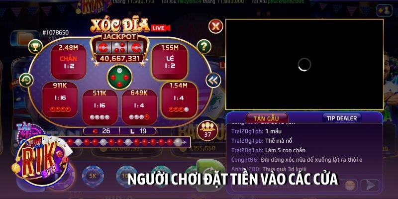 Người chơi đặt tiền vào các cửa